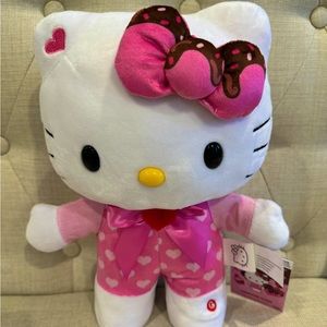 Hello Kitty animated plush, it moves and plays “how sweet it is”